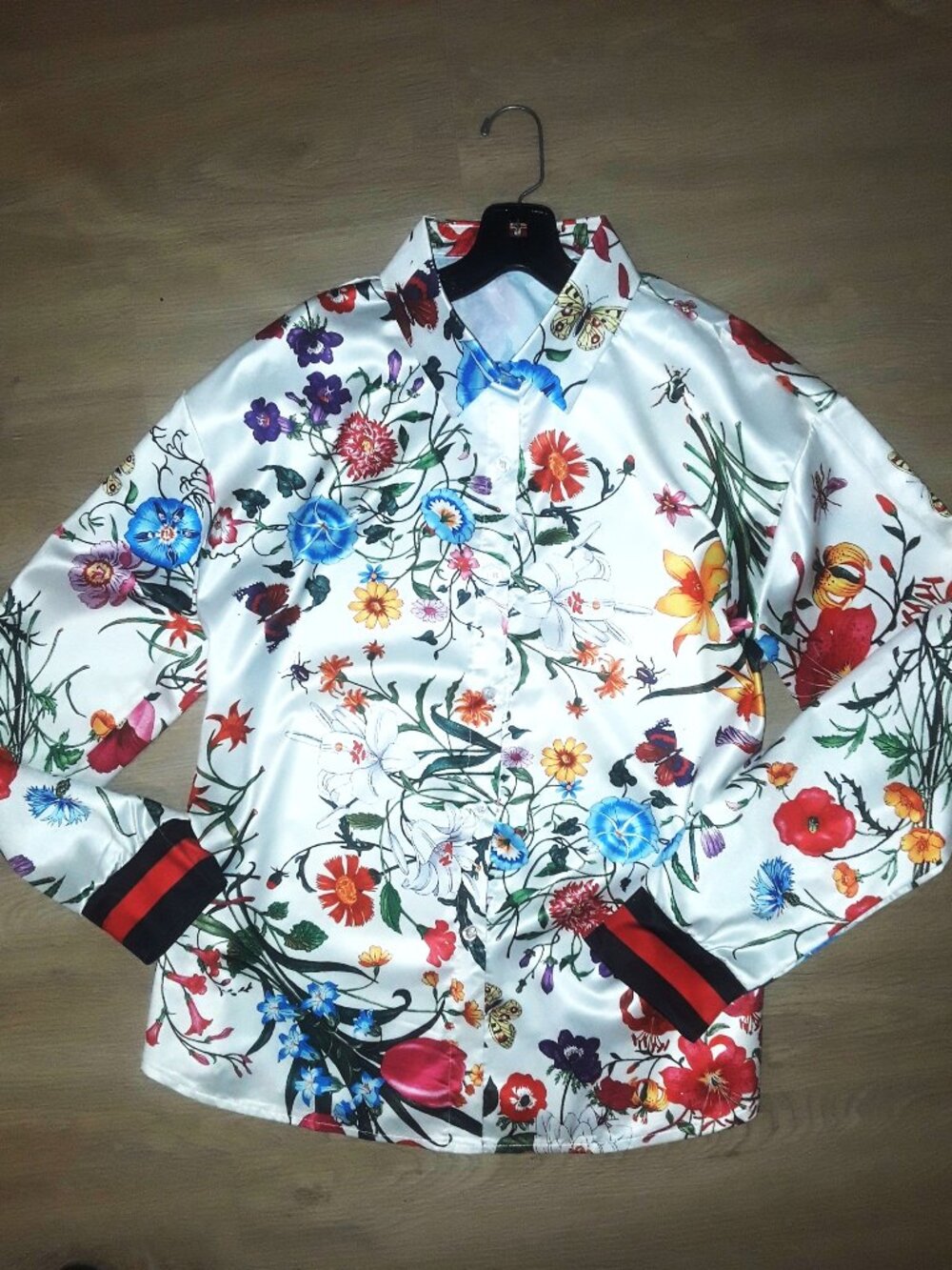 Beautiful designer-like floral flora blouse with web like cuffs